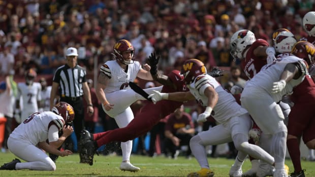 Washington Commanders place kicker Joey Slye (6) kicks the eventual game winning field goal against the Arizona Cardinals during the fourth quarter at FedExField.